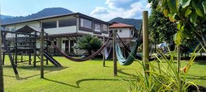 Herní místnost nebo prostor pro děti v ubytování Pousada Cantinho do Sossego Paraty tem Piscina com Vista pra Montanha, Salão de Jogos, Café da Manhã, Estacionamento, Gerador de Energia, Próximo as principais Praias, Ilhas e Cachoeiras