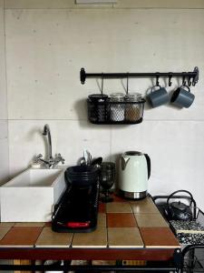 Kuchyň nebo kuchyňský kout v ubytování Jahbazaar Hideout