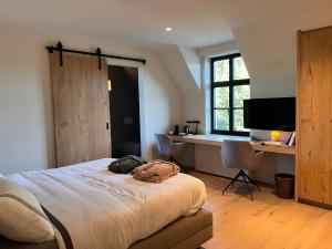 Postel nebo postele na pokoji v ubytování B&B 't Kloosterveld + 37 fotografií