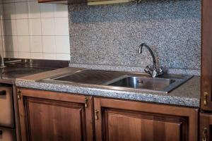 Kuchyň nebo kuchyňský kout v ubytování Casa Vacanze - SportHoliday House Segusino-Valdobbiadene