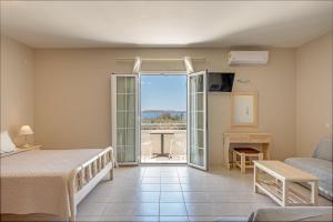 A bed or beds in a room at Oskars Studios & Apartments