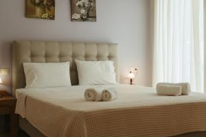 Posteľ alebo postele v izbe v ubytovaní Hotel Livikon