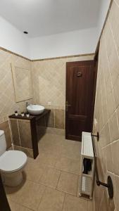 a bathroom with a toilet and a sink at Apartamento La Graciosa- Casa Lapitas in Caleta de Sebo