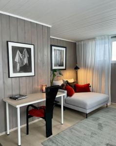 Un pat sau paturi într-o cameră la Et helt hus med utsikt! 10 min fra Trondheim sentrum +28 fotografii