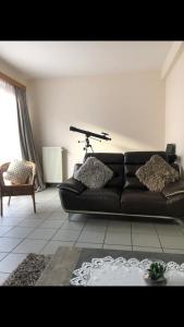 Posezení v ubytování Chambre privée dans une grande maison