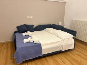 Postel nebo postele na pokoji v ubytování Casa Al Muretto