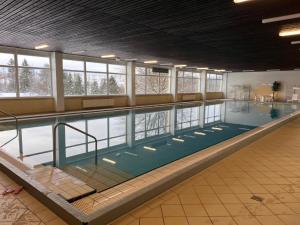 an overhead view of a swimming pool in a building at Exklusive Mini Suite - Panorama Hohegeiß in Braunlage