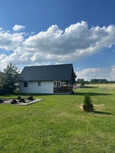 Gallery image of Domek letniskowy 6-osobowy całoroczny nad jeziorem Wilczyńskim in Świętne