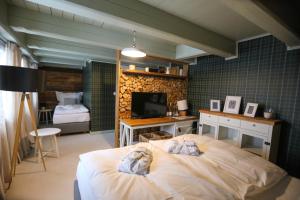 Posteľ alebo postele v izbe v ubytovaní Hotel Bouda Helena