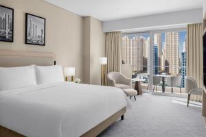 Uma cama ou camas num quarto em JW Marriott Hotel Marina