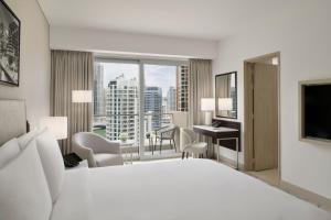 Uma cama ou camas num quarto em JW Marriott Hotel Marina