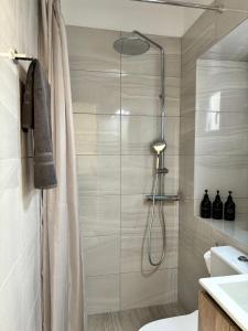 Koupelna v ubytování Kazarma Central Suites + 37 fotografií