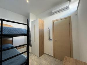 Postel nebo postele na pokoji v ubytování Veranda sul mare di Donnalucata