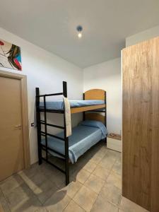 Postel nebo postele na pokoji v ubytování Veranda sul mare di Donnalucata