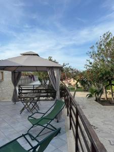 Balkón nebo terasa v ubytování Veranda sul mare di Donnalucata