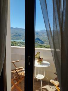 a view of a table and chairs from a door at B&B "Za' Vittoria"#lagodibomba in Bomba