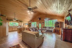 a living room with a couch and a table at RR 9084B3 Texas Blue Wagon in Canyon Lake