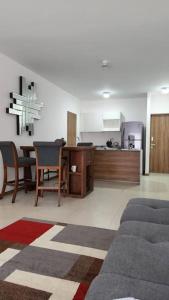 Η κουζίνα ή μικρή κουζίνα στο Departamento en zona sur con Alberca y Vistas Panorámicas +10 φωτογραφίες