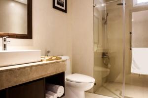 Phòng tắm tại Di lusso Boutique Hotel Riverside Danang