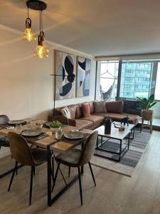 Un lugar para sentarse en Departamento en Las Condes Premium Parque Arauco con Aire Acondicionado