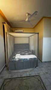 Postel nebo postele na pokoji v ubytování Al Maaroof Appartment