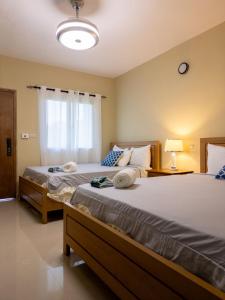 Soficu Hotel El Edén Dominicus客房内的一张或多张床位