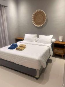 Ένα ή περισσότερα κρεβάτια σε δωμάτιο στο Istirahat Villas and Recovery SPA