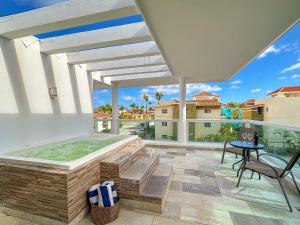 Fotografie z fotogalerie ubytování Gorgeous 1 BR PH apartment w Jacuzzi v destinaci Punta Cana