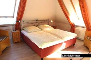 En eller flere senge i et værelse på Haus Meeresblick WM516