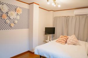 Cama ou camas em um quarto em 2階 小岩駅徒歩15分 収容4人 成田羽田からバス直通
