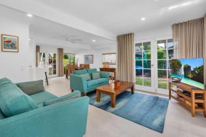 Posezení v ubytování 15 Coco Bay Resort