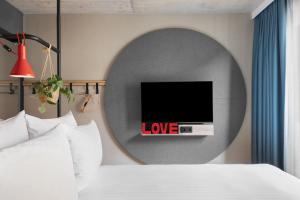Stay KooooK Leipzig City - Online Check In客房内的一张或多张床位