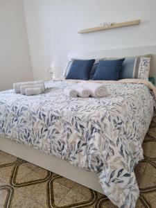 Una cama o camas en una habitación de Scià sul Mare
