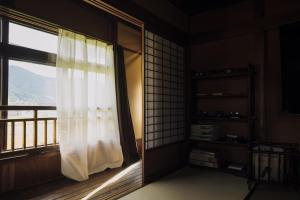 صورة لـ 旅館依山盡イサンジン في Maniwa