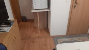 Kuchyň nebo kuchyňský kout v ubytování levinja