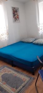 Postel nebo postele na pokoji v ubytování levinja