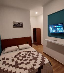 Ένα ή περισσότερα κρεβάτια σε δωμάτιο στο Riche Heritage Hotel