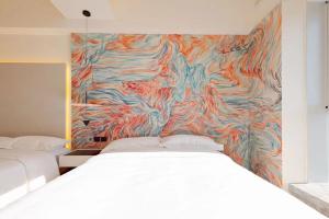 Postel nebo postele na pokoji v ubytování Dream Inn Hotel Beijing