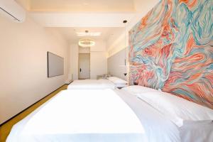 Postel nebo postele na pokoji v ubytování Dream Inn Hotel Beijing