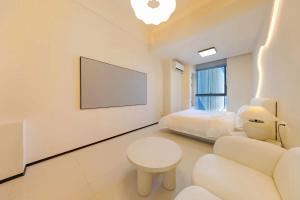 Postel nebo postele na pokoji v ubytování Dream Inn Hotel Beijing
