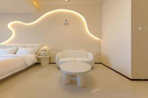 Postel nebo postele na pokoji v ubytování Dream Inn Hotel Beijing