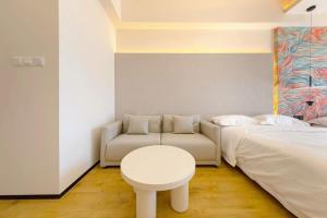 Postel nebo postele na pokoji v ubytování Dream Inn Hotel Beijing