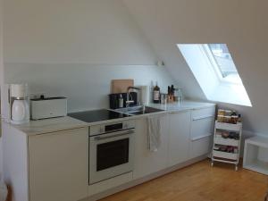 Cucina o angolo cottura di Dachgeschosswohnung Seeblick