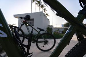 a bike parked in front of a building at TAIGA Almeria Playa in Palomares