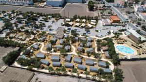 an overhead view of a suburb with a pool at TAIGA Almeria Playa in Palomares