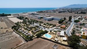 an aerial view of a city with a beach at TAIGA Almeria Playa in Palomares