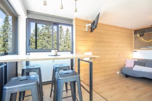 Postel nebo postele na pokoji v ubytování Le Cocon d'Edwige - Vue montagne