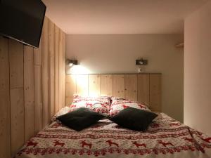 Postel nebo postele na pokoji v ubytování Le Cocon d'Edwige - Vue montagne