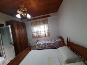 Postel nebo postele na pokoji v ubytování Lungomare home