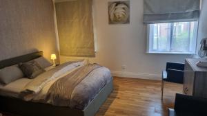 Ένα ή περισσότερα κρεβάτια σε δωμάτιο στο Cheerful 4 bedroom